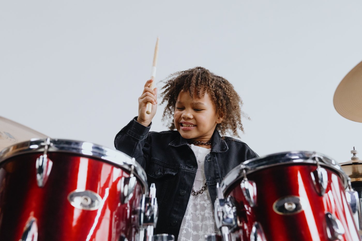Young performer drumming